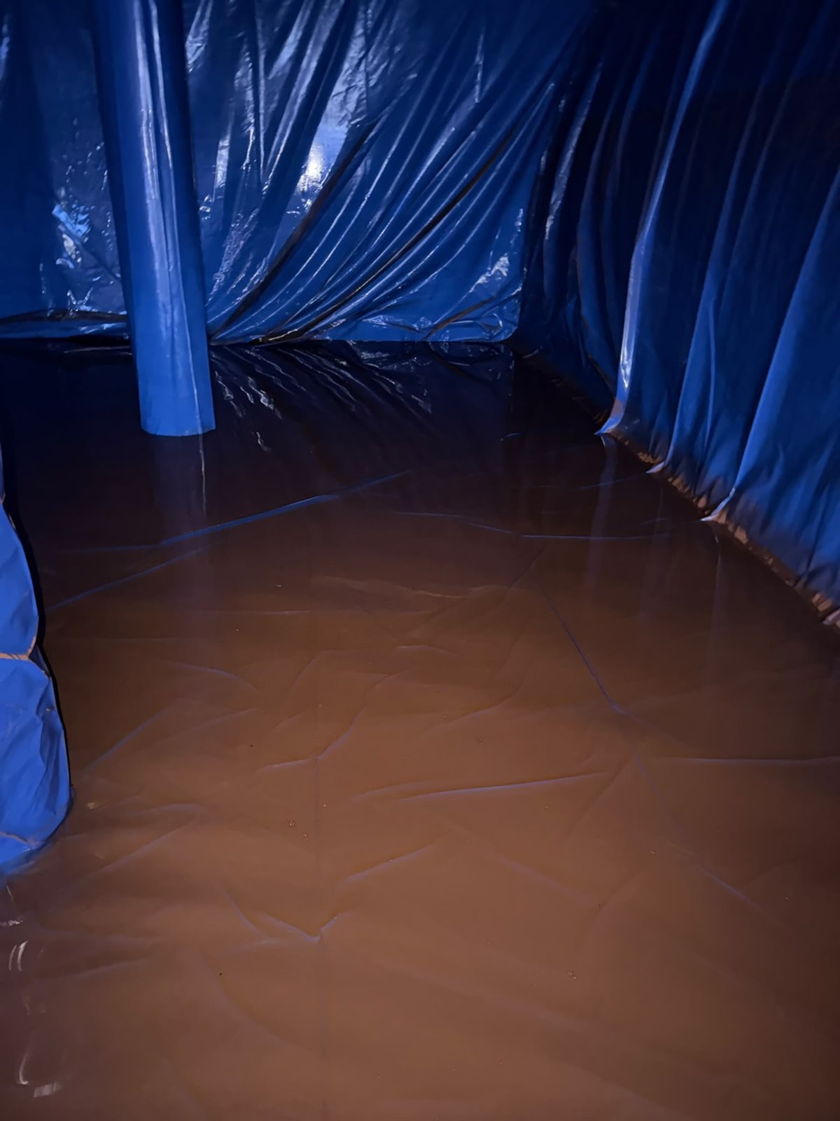 Lined tank floor — before