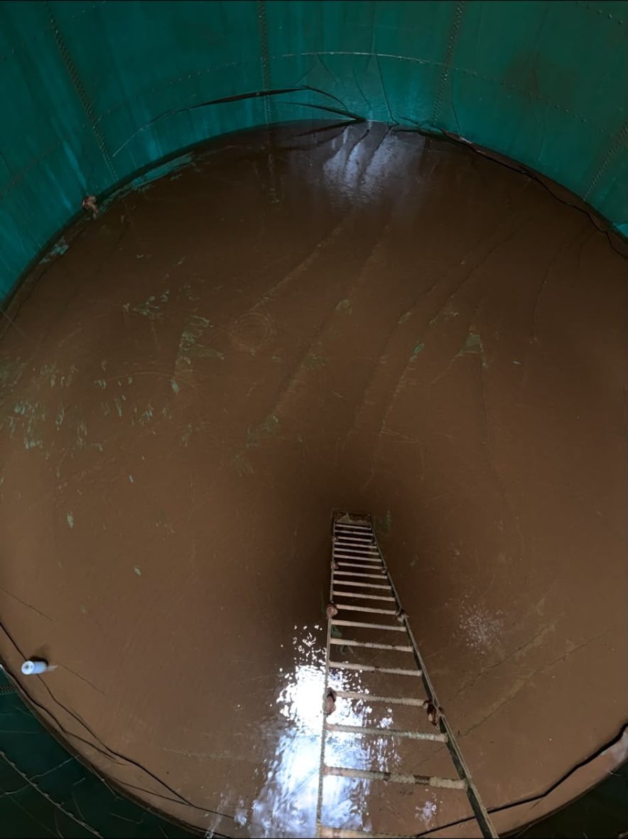 Tank floor and access ladder — before