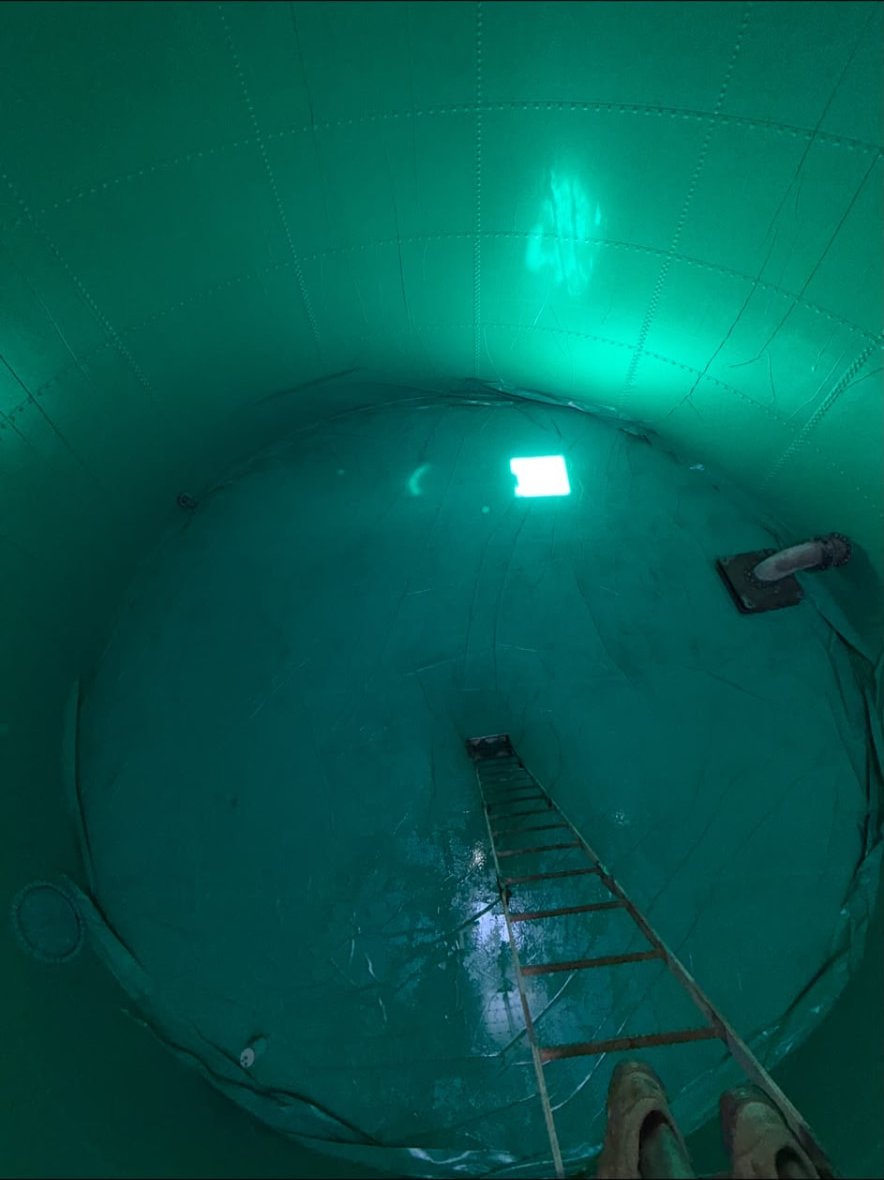 Tank floor and access ladder — after
